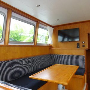 Jachtreparatie zithoek hout en blauw
